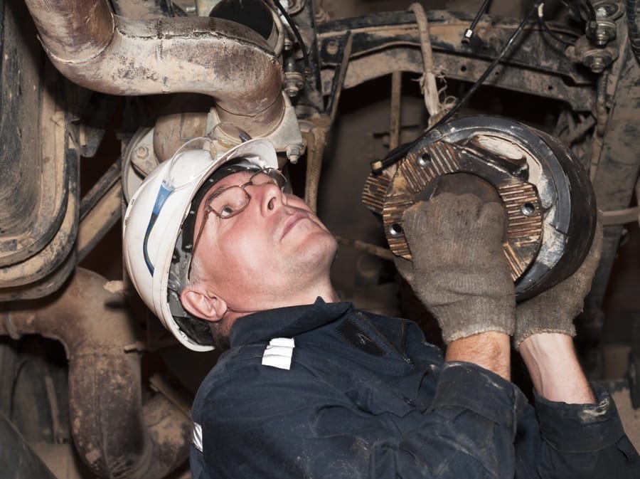 man working on a vehicle