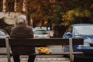 man sitting on a bench alone