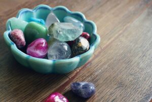 ceramic bowl full of gemstones